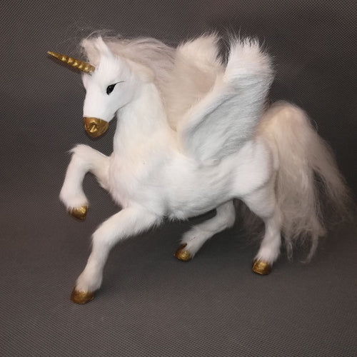 What dreams are made of...Your own 7 in x 9 in white unicorn Decor. Beautiful quality prepared hard model,polyethylene&fur unicorn with wings